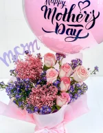 Floral Embrace For Mom | Flowers | Event decoration Services | flowers decoration near me | flower studio pakistan | bukey near me