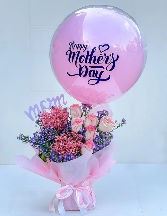 Floral Embrace For Mom | Flowers | Event decoration Services | flowers decoration near me | flower studio pakistan | bukey near me